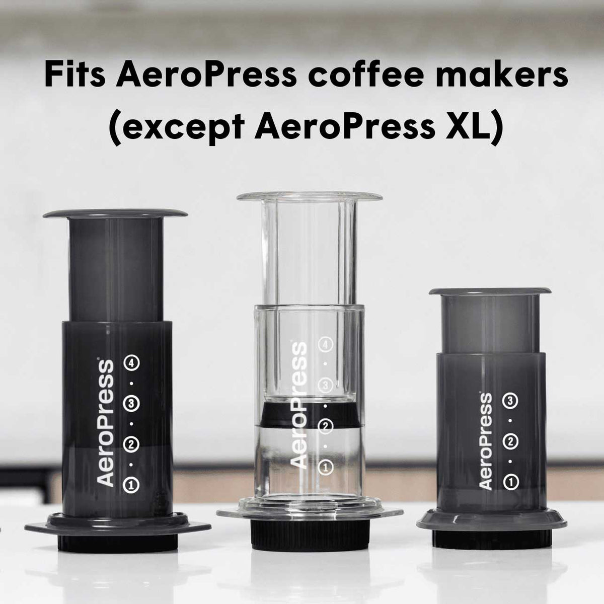 Standard-size AeroPress brewer compatibility illustration; brewers not included and filter does not fit AeroPress XL