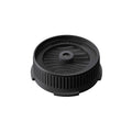 AeroPress Flow Control Filter Cap in black, shown at an angle on a white background.