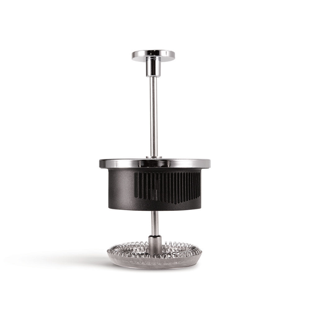 Yama French press lid and plunger assembly with stainless steel mesh filter, removed from the carafe.