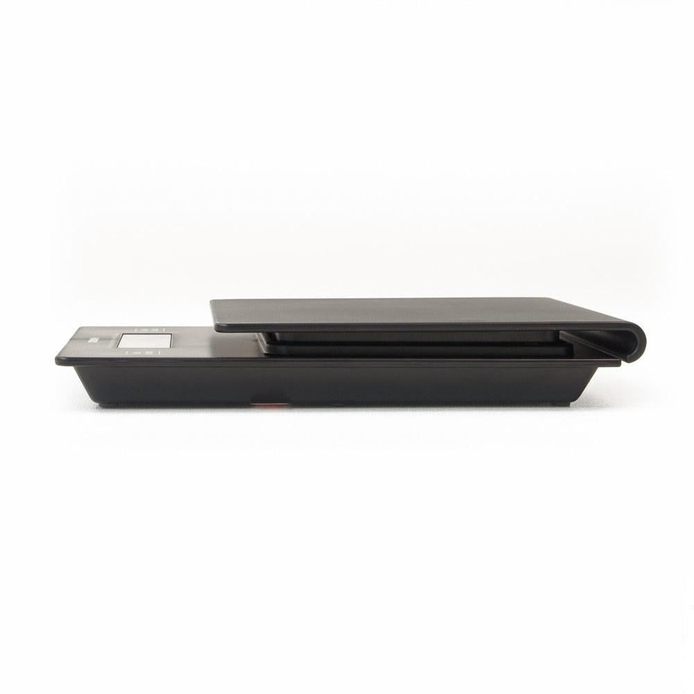 Side profile of the black Hario V60 drip scale and timer showing its slim body.