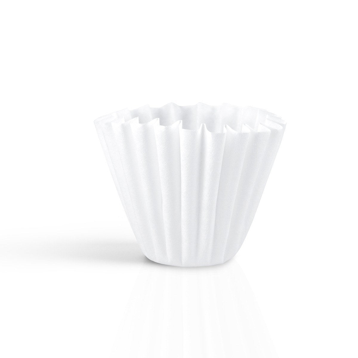 Single white Kalita Wave 185 paper filter standing on a white background.