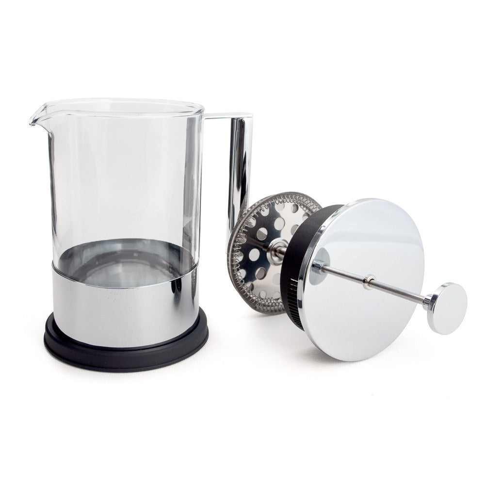Yama French press glass carafe standing beside its lid and plunger assembly.